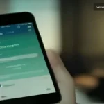 Smartphone ekranında otel rezervasyon uygulaması arayüzü gösteren profesyonel otel rezervasyon sayfası